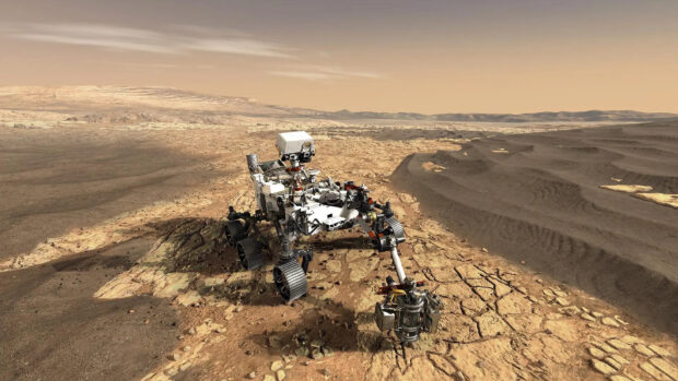 The Mars Curiosity Rover is captured navigating the rocky surface of Mars with its scientific instruments, HD Desktop Wallpaper