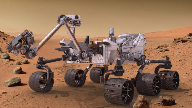 The Mars Curiosity Rover explores the rocky terrain of Mars with advanced instruments, HD Desktop Wallpaper