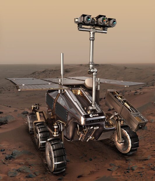 A Mars curiosity rover explores rocky terrain on Mars, HD Desktop Wallpaper