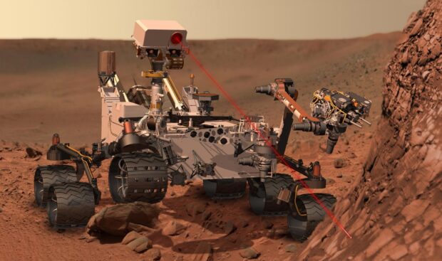The Mars Curiosity Rover scans the rocky surface on Mars with its laser, HD Desktop Wallpaper