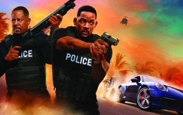 Martin Lawrence holds a shotgun in an action movie scene with vibrant background, 2K Desktop Wallpaper