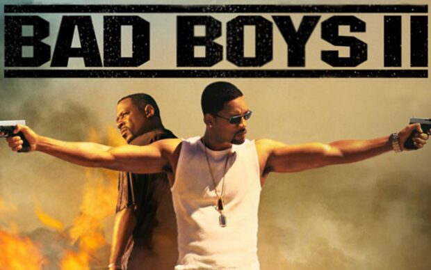 Martin Lawrence and Will Smith stand back to back aiming guns, 2K Desktop Wallpaper