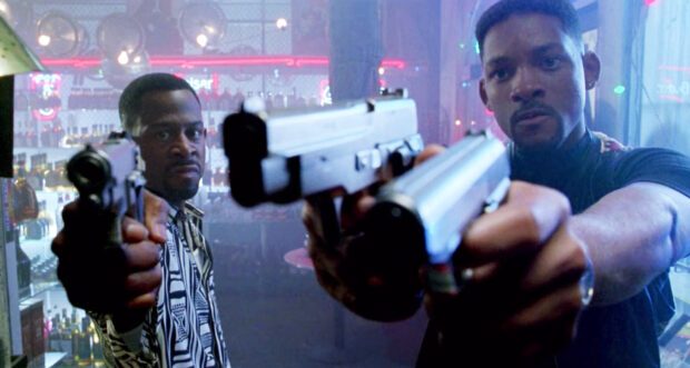 Martin Lawrence and Will Smith pointing guns in a neon lit room, HD Desktop Wallpaper