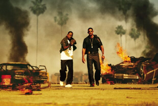 Martin Lawrence and Will Smith walk through fire and smoke in an intense moment, HD Desktop Wallpaper