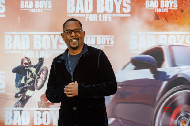 Martin Lawrence smiles while standing in front of a Bad Boys for Life promotional backdrop, 2K Desktop Wallpaper