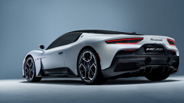 The Maserati Mc20 displays its sleek rear design in a studio setting, 4K Desktop Wallpaper