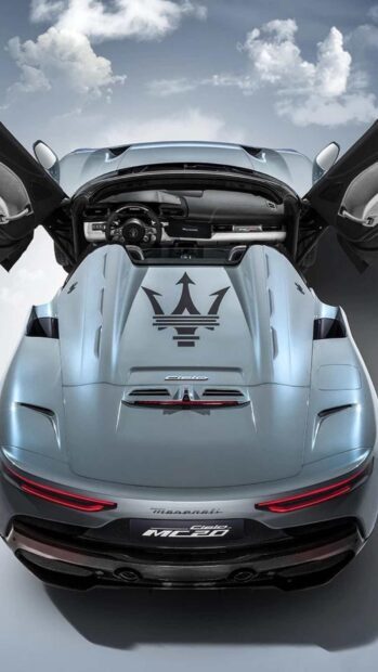 A sleek Maserati MC20 with doors open shows its stylish interior and rear design, HD Phone Wallpaper