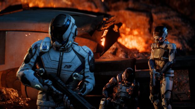 Three Mass Effect Andromeda characters stand ready in futuristic armor near a fiery background, 4K Desktop Wallpaper