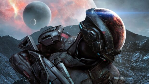 A soldier in advanced armor stands on a rocky planet with planets visible in the sky in Mass Effect Andromeda, 4K Desktop Wallpaper