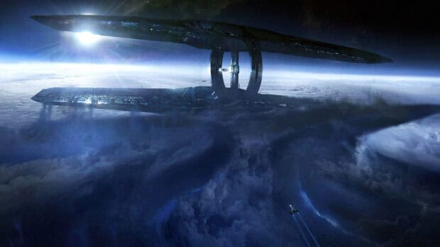 A spaceship approaches a large space station above a cloudy planet in Mass Effect Andromeda, HD Desktop Wallpaper