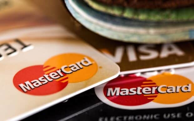 MasterCard logos are displayed on several cards stacked together in this image, HD Desktop Wallpaper