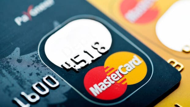 A close up of Mastercard logos on several credit cards, HD Desktop Wallpaper