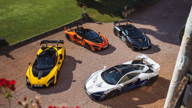 Four McLaren Senna cars parked in a driveway, 4K Desktop Wallpaper