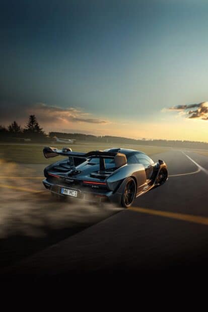 A McLaren Senna is drifting on a runway during sunset, HD Mobile Wallpaper
