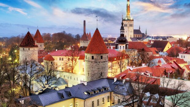 The evening view of medieval towers and historic buildings in Tallinn captures Estonia wallpapers charm and history, HD Desktop Wallpaper