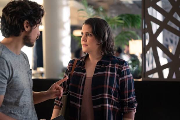 Melanie Lynskey talks with a man in a casual setting wearing a plaid shirt, HD Desktop Wallpaper