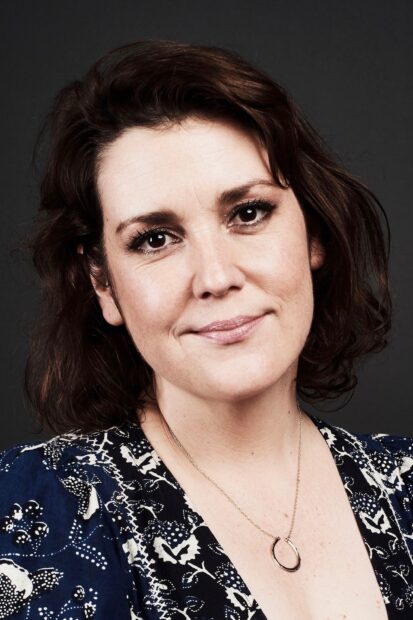 Melanie Lynskey looks directly at the camera with a gentle smile, 2K Portrait Wallpaper