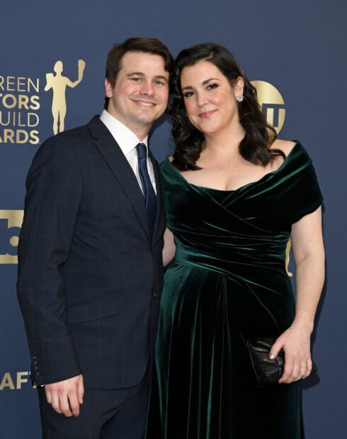 Melanie Lynskey poses with a man at a formal event, HD Mobile Wallpaper