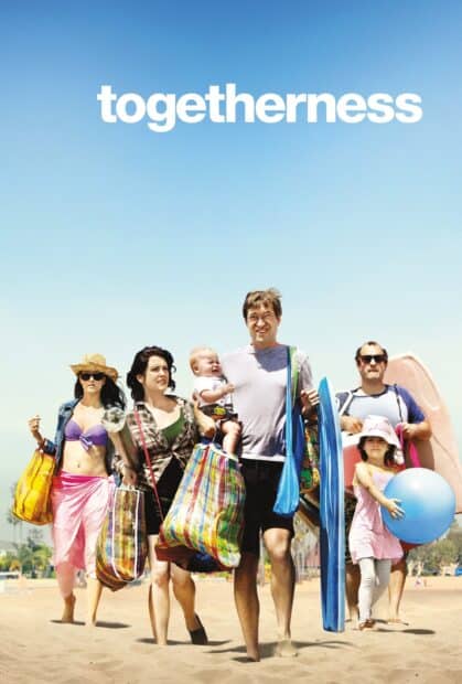 A group of people including Melanie Lynskey carrying beach gear walking on the sand, 2K Mobile Wallpaper