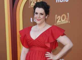 Melanie Lynskey smiles wearing a red dress at a television event, HD Desktop Wallpaper