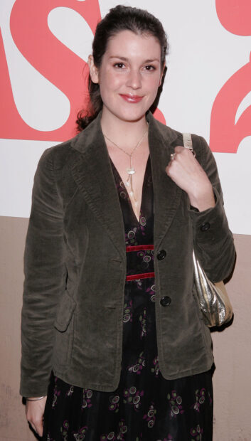 Melanie Lynskey is wearing a brown jacket and floral dress at an event, 2K Mobile Wallpaper