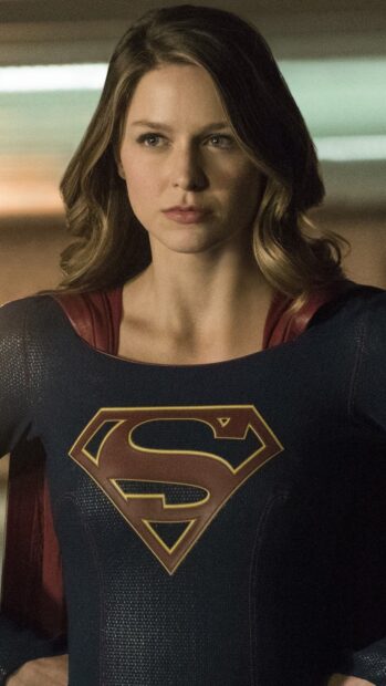 Melissa Benoist wears the Supergirl suit with a serious expression, 4K Phone Wallpaper