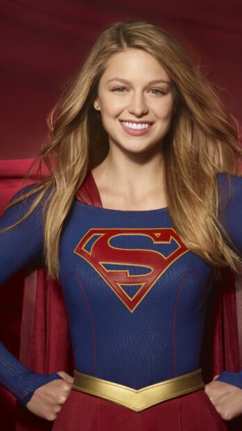 Melissa Benoist proudly poses in her Supergirl outfit with a confident smile, 4K Phone Wallpaper