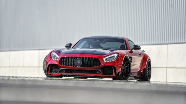 A red Mercedes Benz Amg Gt parked with a modern building background, 4K Desktop Wallpaper