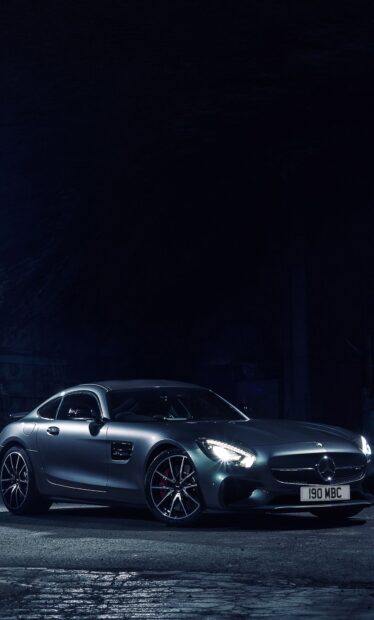 A sleek Mercedes Benz Amg Gt is parked at night with headlights on, HD Mobile Wallpaper