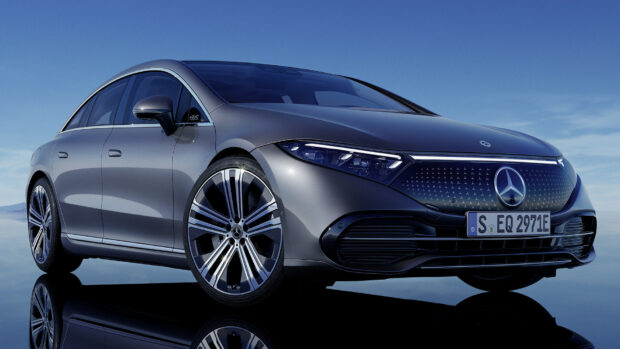 A silver Mercedes Benz Eqs car is displayed with a clear sky background, HD Desktop Wallpaper