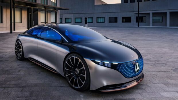 A futuristic Mercedes Benz Eqs is parked on a modern stone pavement near a building, HD Desktop Wallpaper