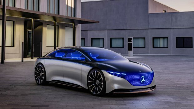 The Mercedes Benz Eqs showcases a sleek futuristic design with illuminated grille and blue interior lighting, 2K Desktop Wallpaper
