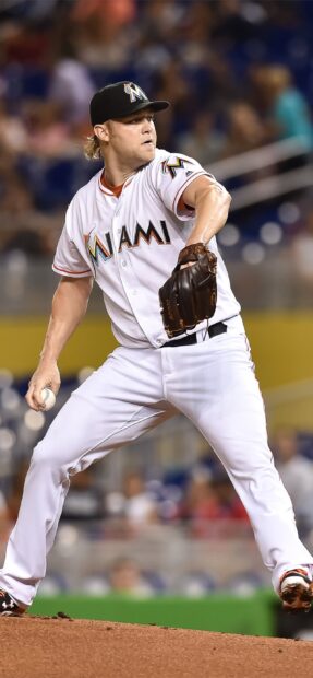 A Miami Marlins player pitching during a game on the mound, 2K Mobile Wallpaper