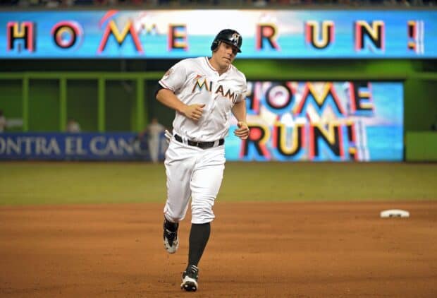 A Miami Marlins player runs the bases after hitting a home run during the game, HD Desktop Wallpaper