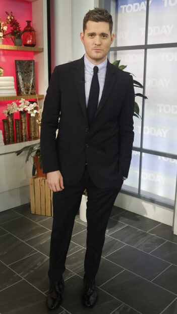 Michael Buble is posing in a black suit with a blue shirt and tie, HD Phone Wallpaper