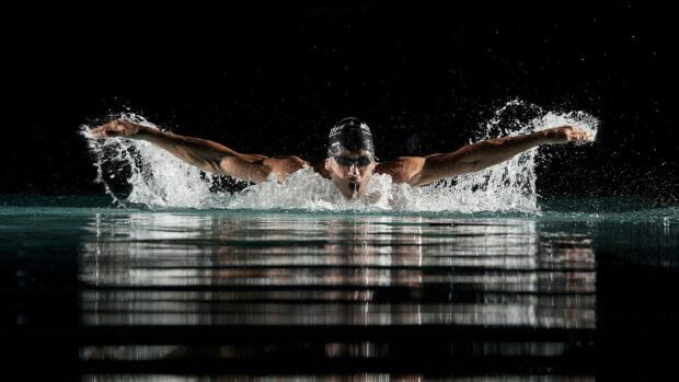 Michael Phelps butterfly stroke captured in water during competition, HD Desktop Wallpaper