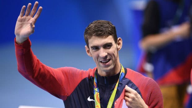 Michael Phelps is waving and smiling after winning a medal at the Olympic Games, HD Desktop Wallpaper