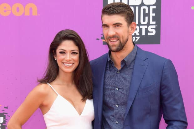 Michael Phelps appears smiling with his wife at a public event, HD Desktop Wallpaper