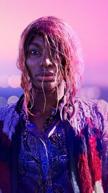 A portrait of Michaela Coel with wet hair and vibrant clothes during sunset, HD Phone Wallpaper