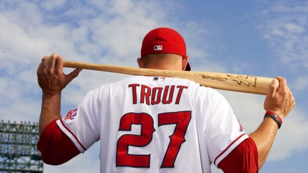 Mike Trout holds a baseball bat while wearing the Los Angeles Angels uniform with number 21, 4K Desktop Wallpaper