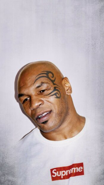 Mike Tyson poses wearing a Supreme shirt with his face tattoo visible, HD Phone Wallpaper