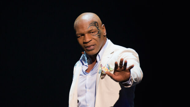 Mike Tyson Wallpapers feature the iconic boxer with facial tattoo performing, HD Desktop Wallpaper