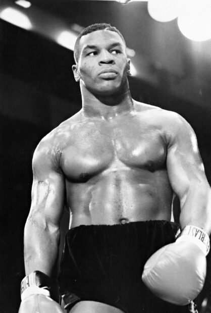 Mike Tyson looks focused and powerful during a boxing match, 2K Desktop Wallpaper