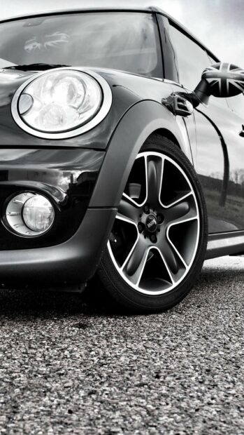 A close up view of a Mini Cooper wheel and side mirror with a Union Jack design, HD Phone Wallpaper