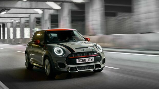 A Mini Cooper is driving through an urban tunnel with blurred motion effects, HD Desktop Wallpaper