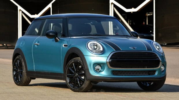 A blue Mini Cooper car is parked on the street in bright daylight, HD Desktop Wallpaper