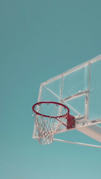 A basketball hoop with a transparent backboard stands under a clear blue sky, HD Phone Wallpaper