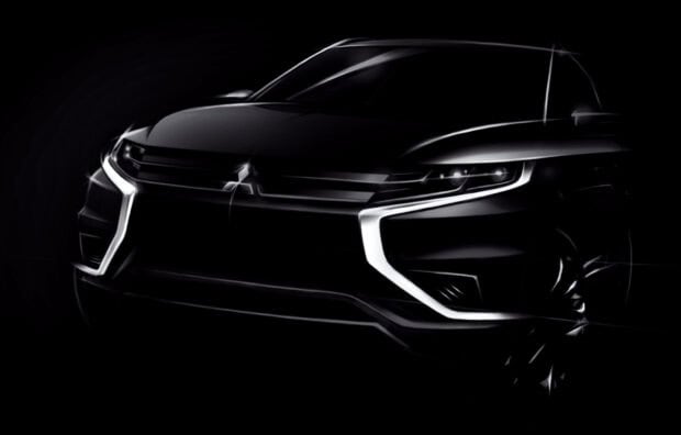 The Mitsubishi Outlander is shown with illuminated front lights in a sleek design, HD Desktop Wallpaper