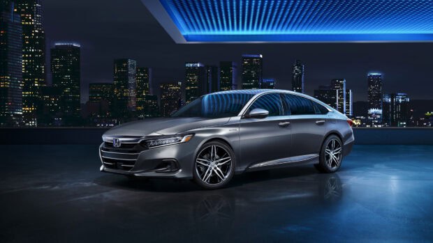 A sleek Honda Accord is parked with city lights glowing in the background, HD Desktop Wallpaper