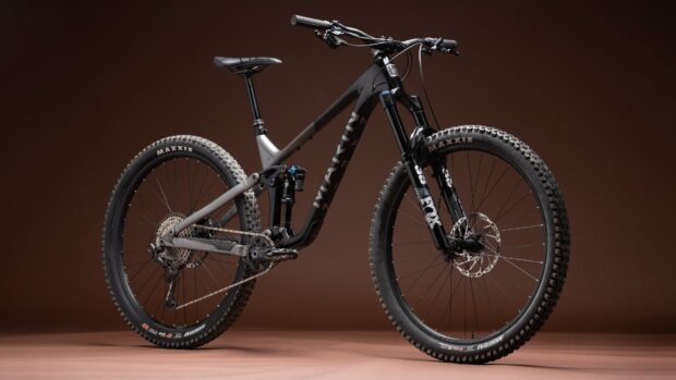 A sleek Marin mountain bike is displayed against a brown background, HD Desktop Wallpaper